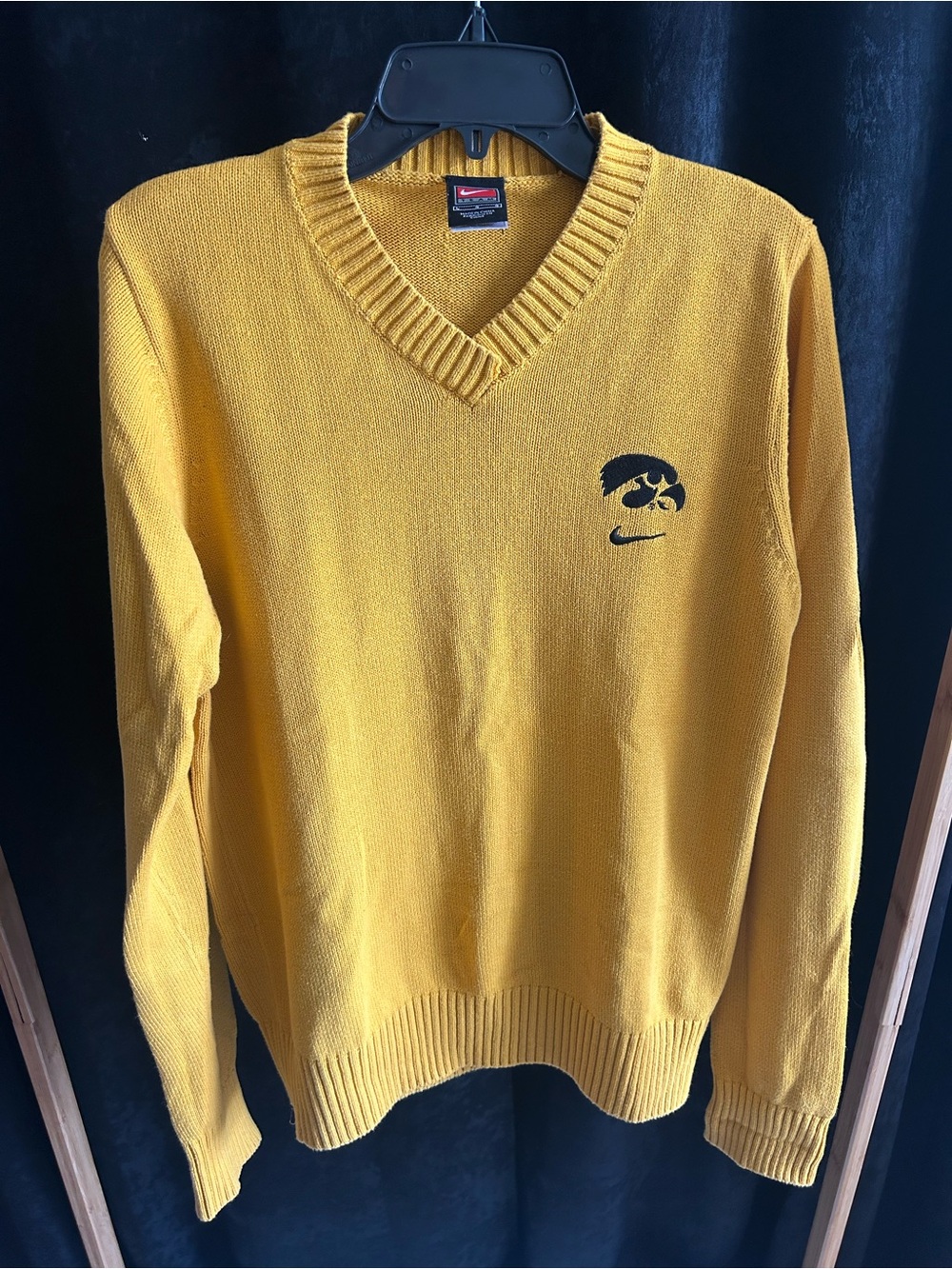 Vintage Nike Women's Gold V-Neck Sweater with Black Logo
